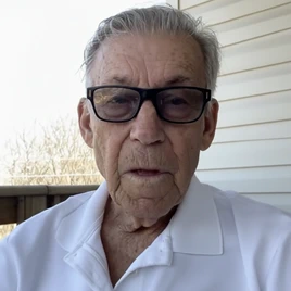 Woman looking stressed with hands on face